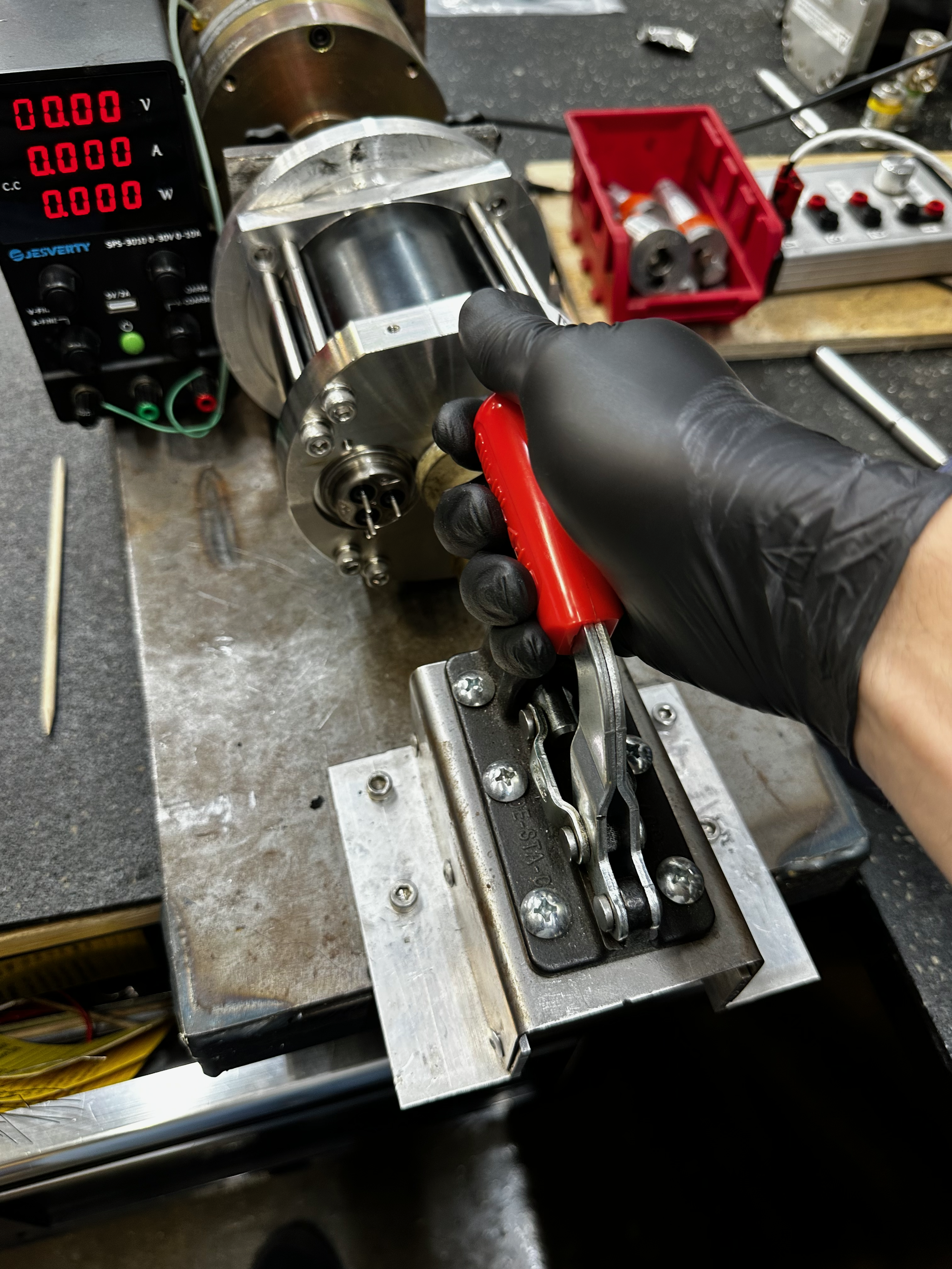 red lever actuated holding the motor flush and tight