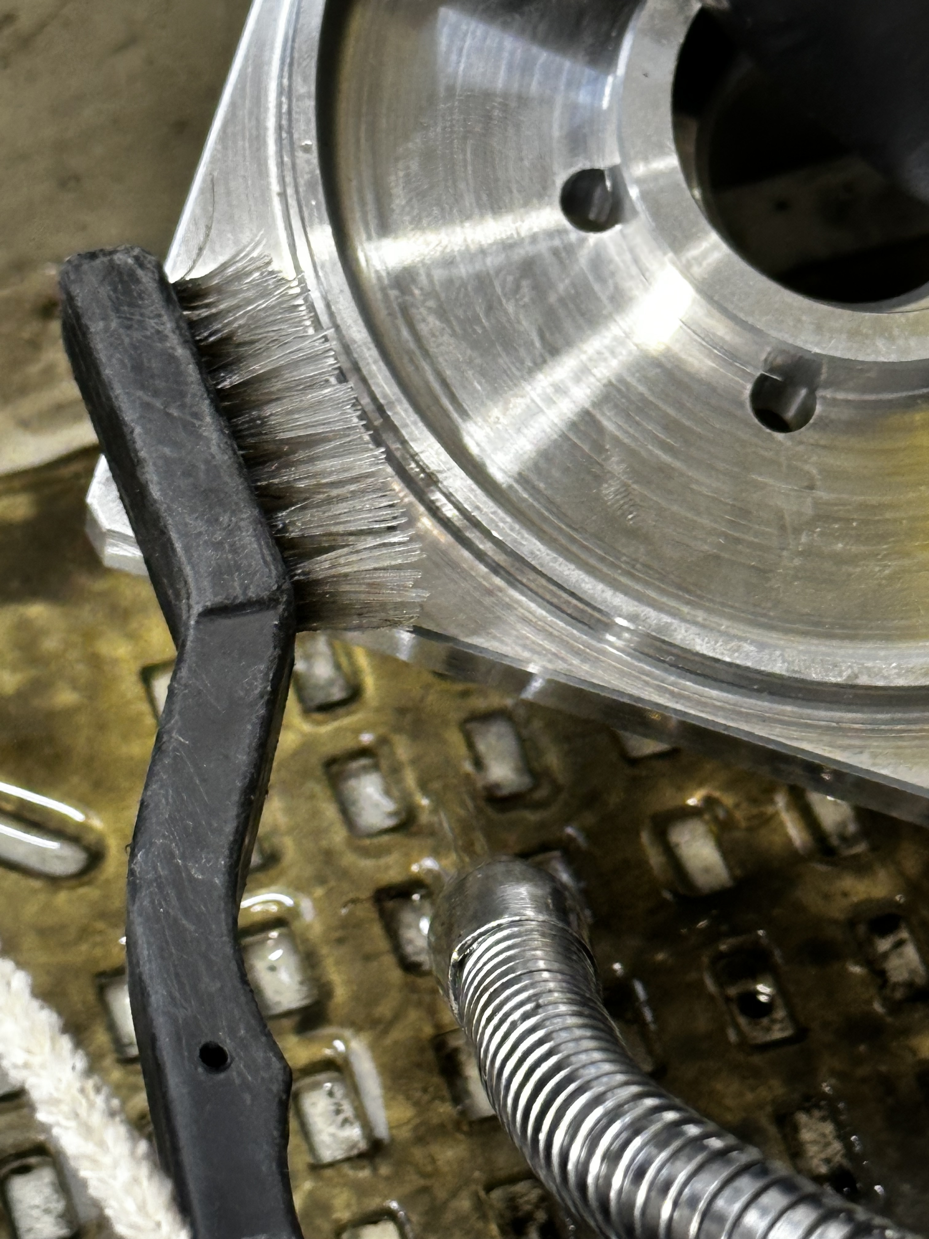 brush cleaning the oring gland.