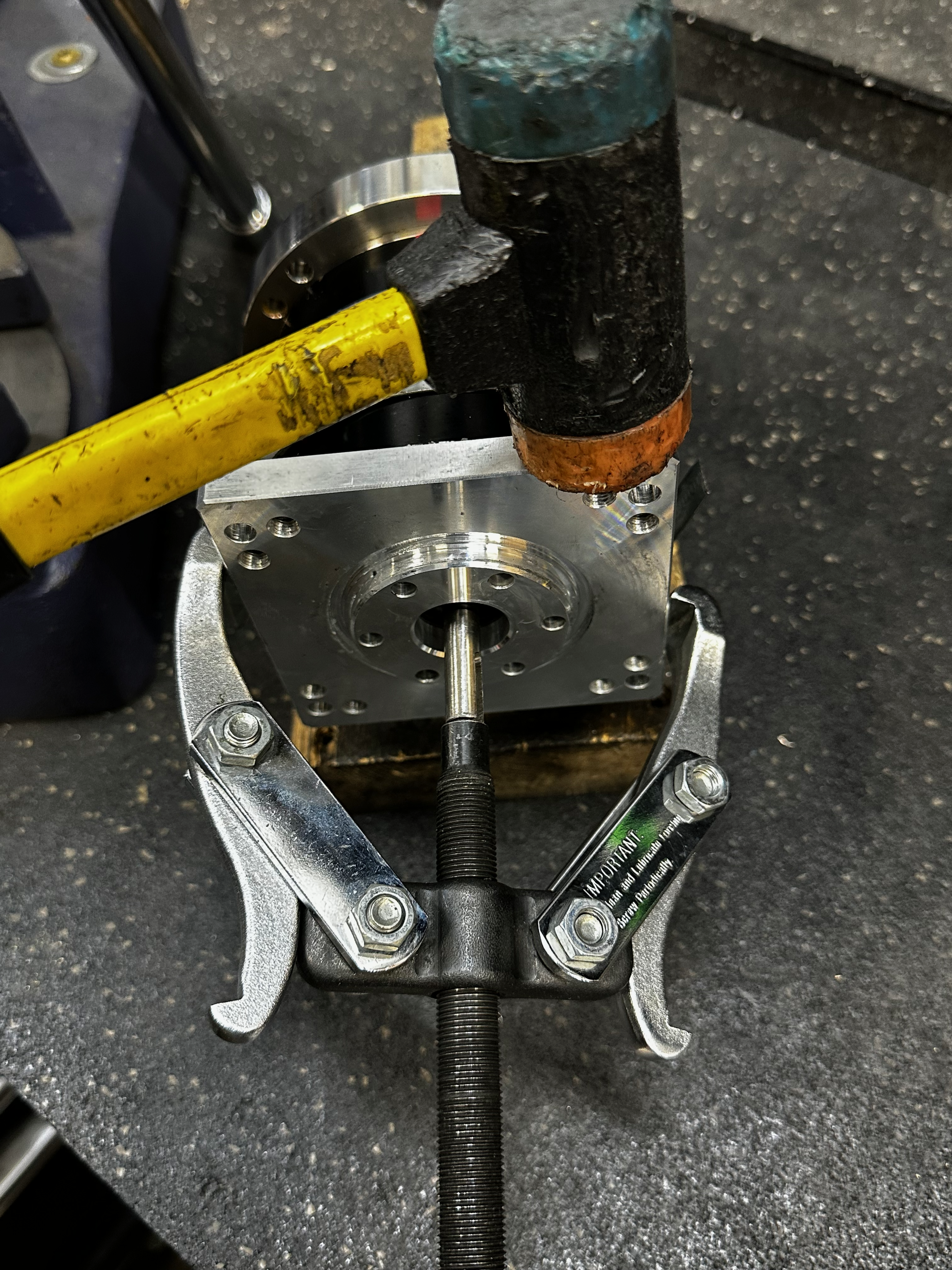 Tap with rubber mallet