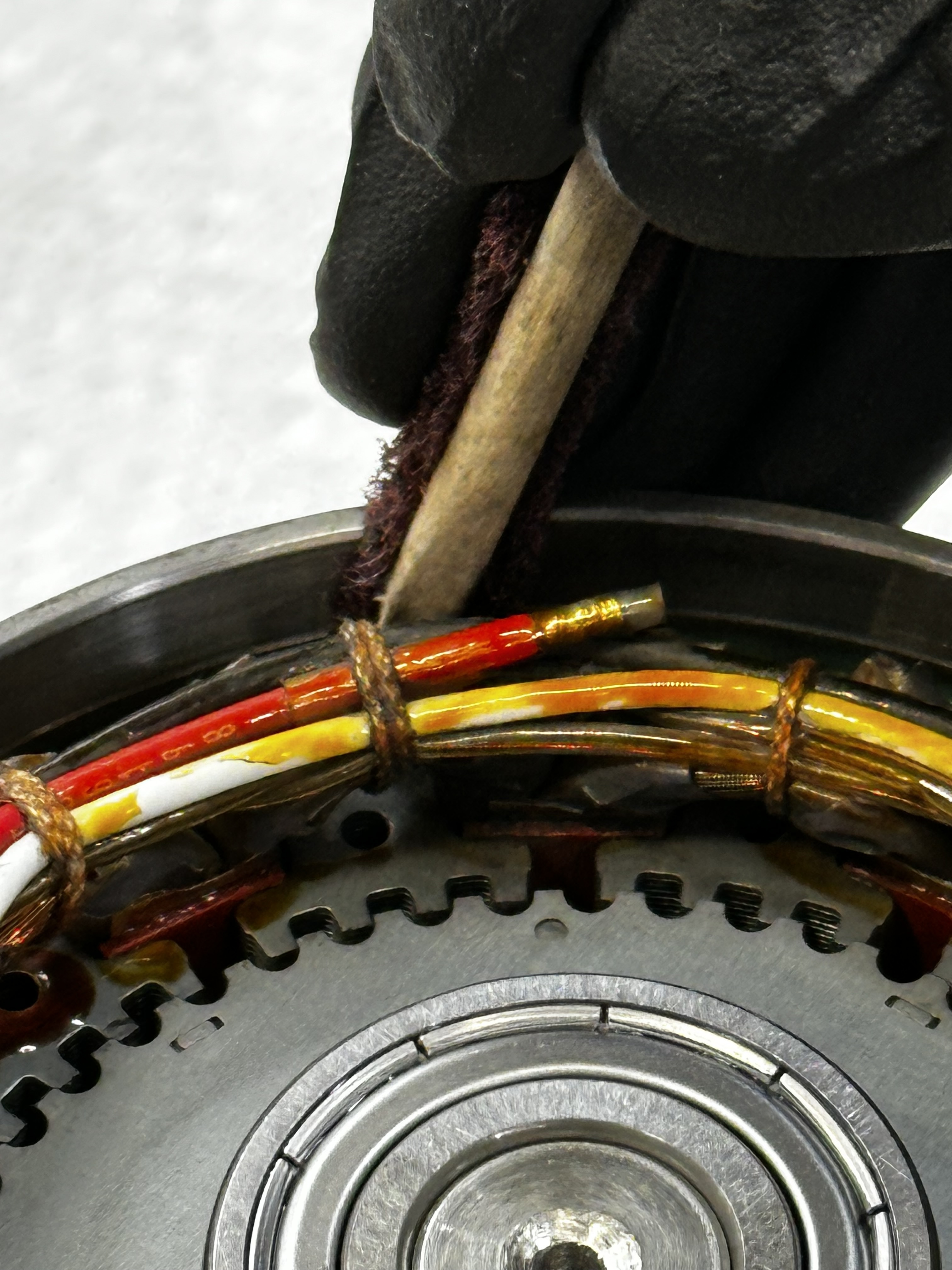 scotch brite on the wooden pick.