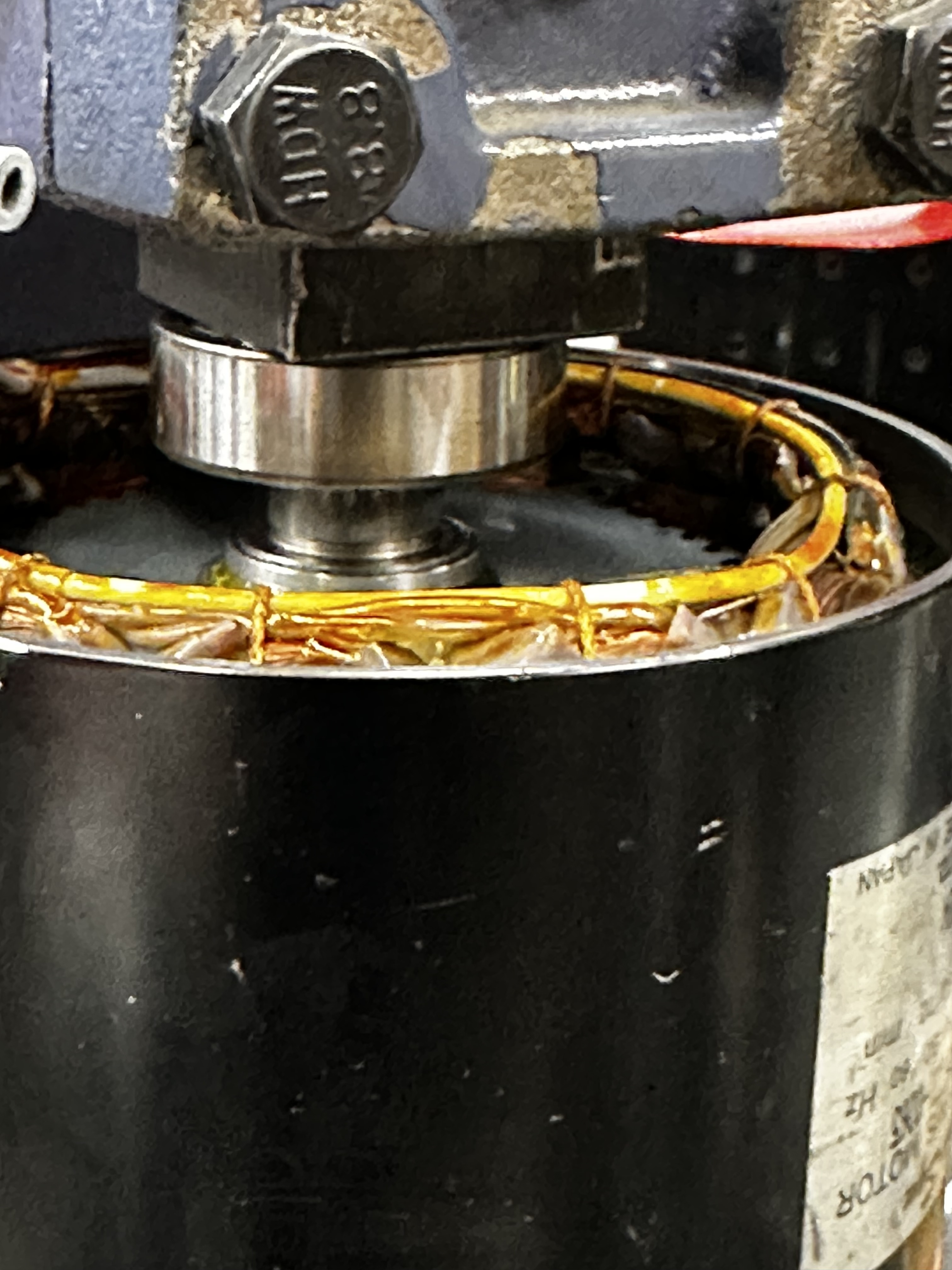 motor under the ram of the arbor press.