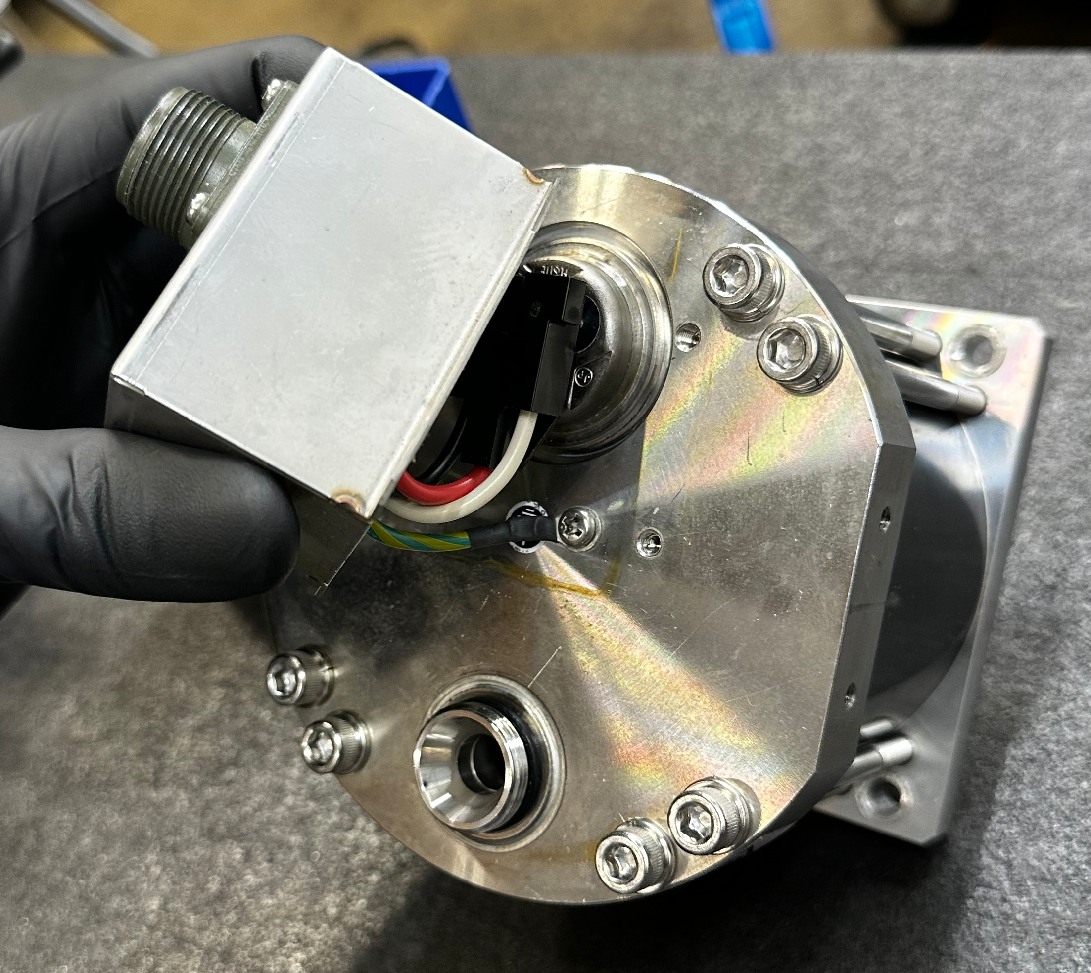 Receptacle cover lifted